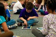 Kindergartners at Explore Knowledge Academy use Apple iPads during class to enhance their learning experience. Thursday Feb. 16, 2012.